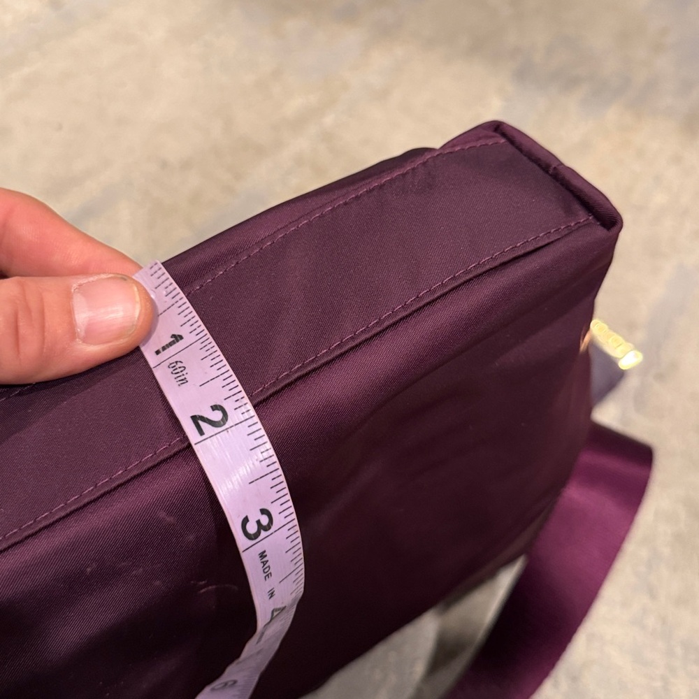 TUMI
Voyageur Capri Crossbody plum purple color in GUC - Picture 12 of 12